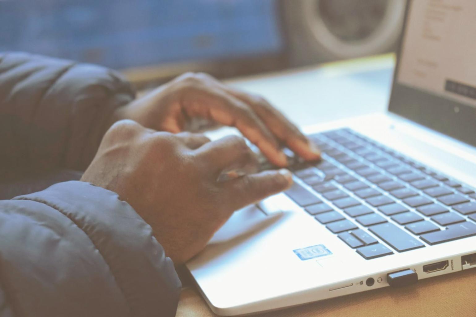 Financial analyst reviewing documents and data